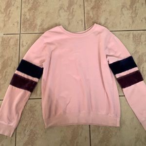 Large sweater from a boutique runs very small.